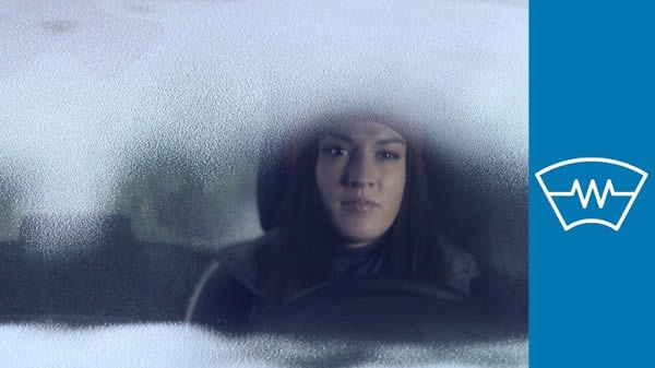 FordPass Connect - woman sitting in a car with frosted up window